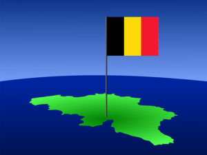 map of Belgium and Belgian flag on pole illustration