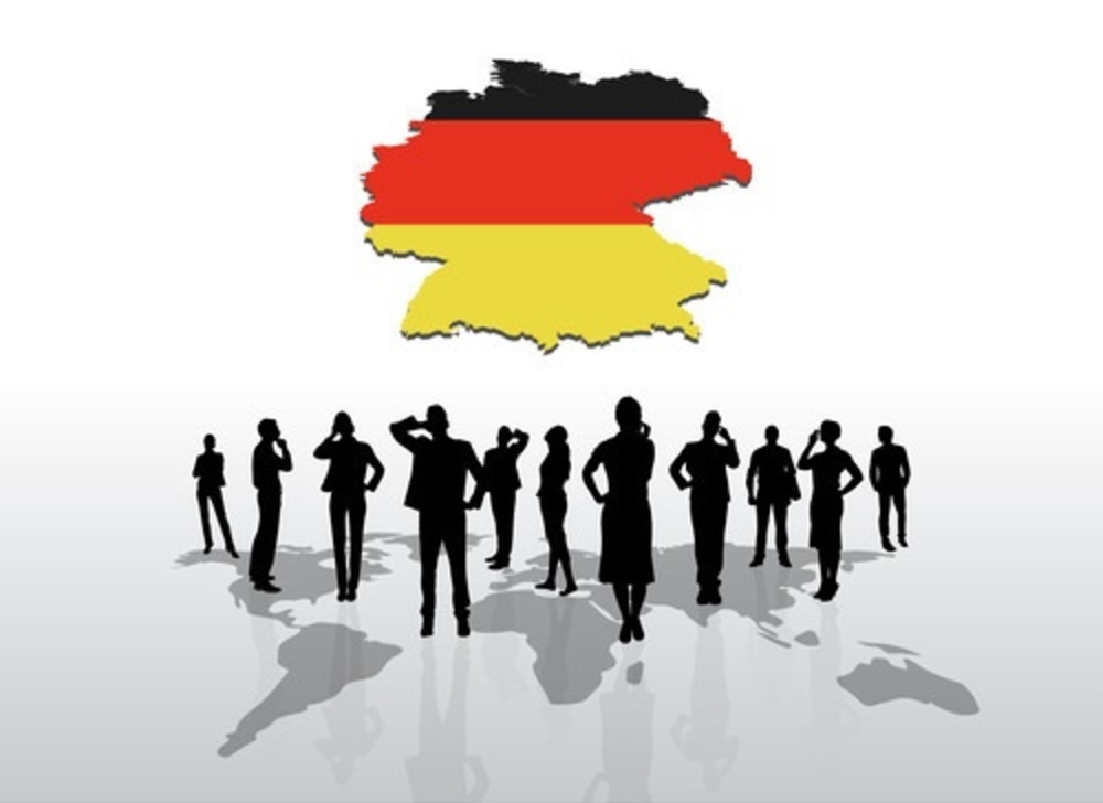 Digitally generated Business people standing under germany graphic