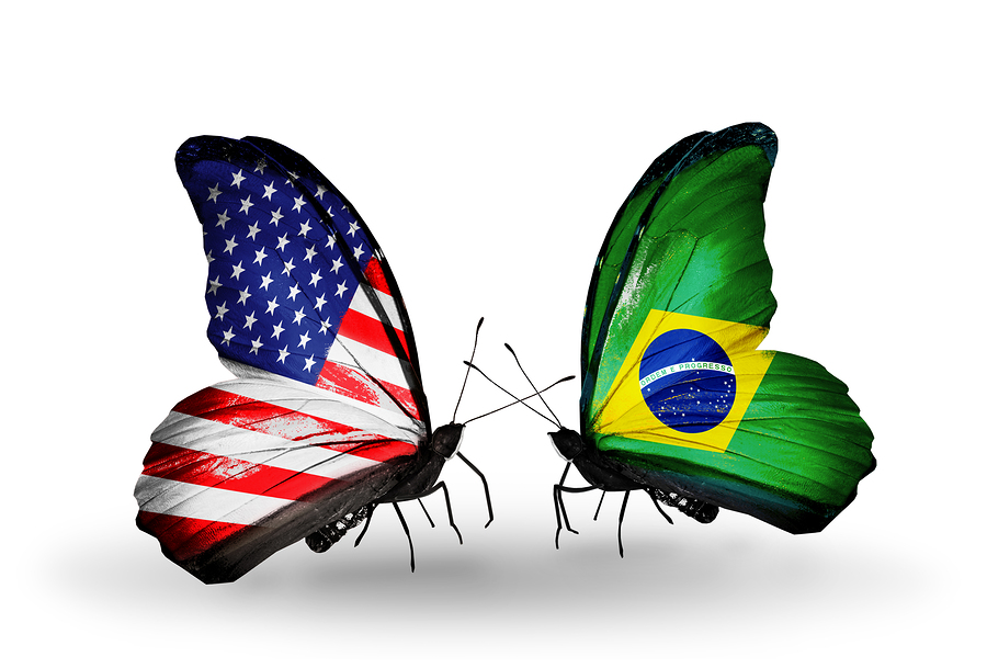 Two butterflies with flags on wings as symbol of relations USA and Brazil