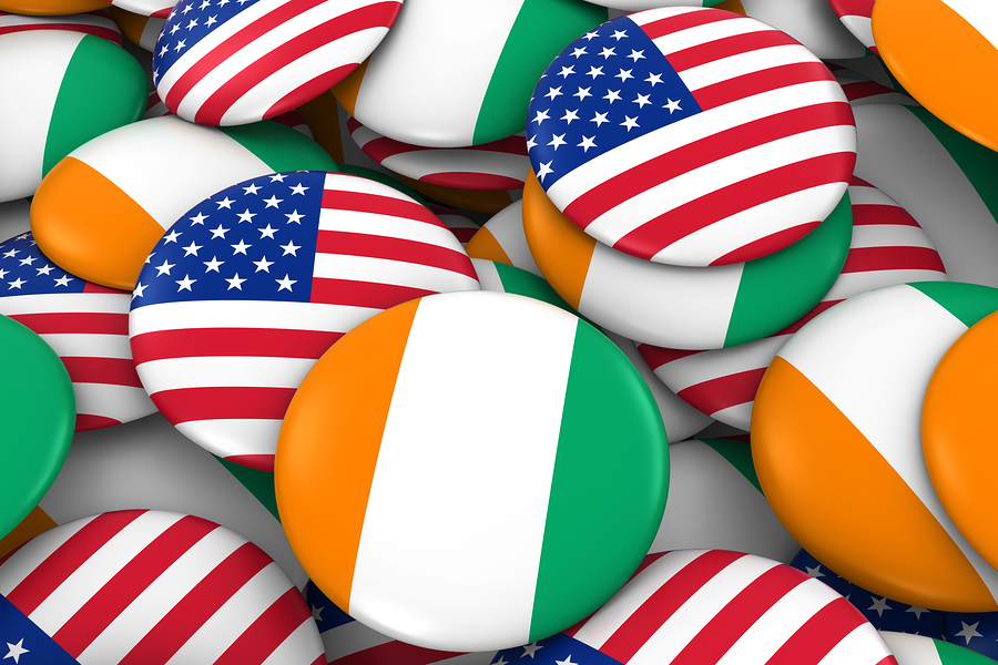 USA and Cote d'Ivoire Badges Background - Pile of American and Ivorian Flag Buttons 3D Illustration