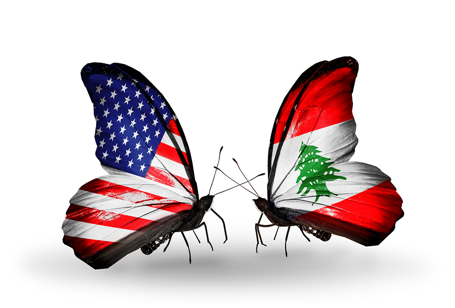 Two butterflies with flags on wings as symbol of relations USA and Lebanon