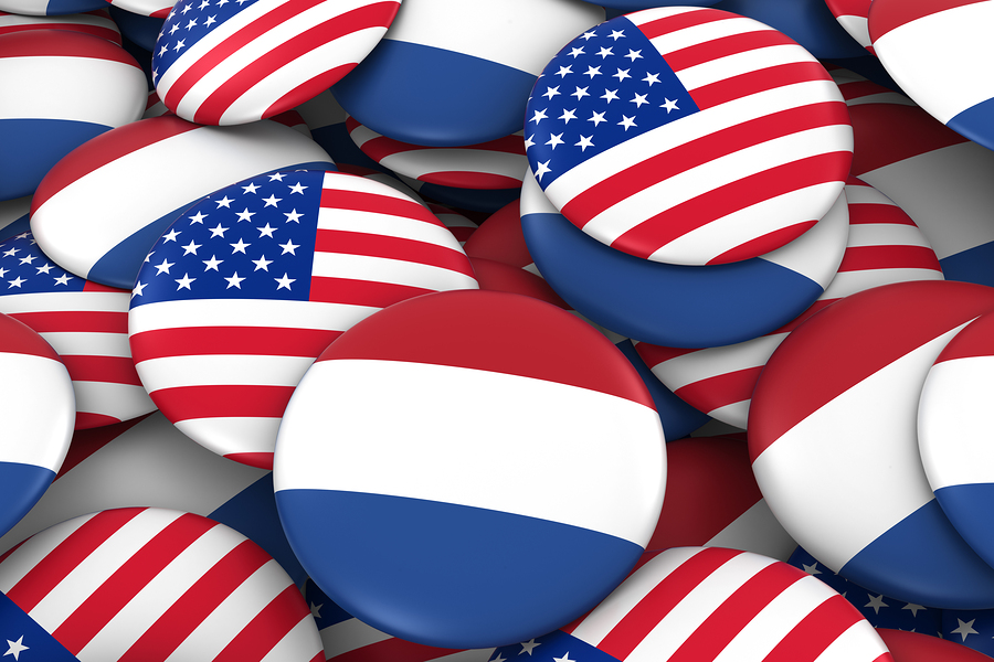 Netherlands and USA Badges Background - Pile of Dutch and US Flag Buttons 3D Illustration