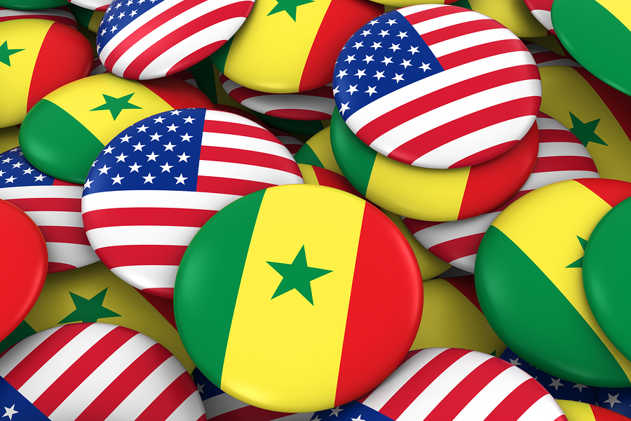 USA and Senegal Badges Background - Pile of American and Senegalese Flag Buttons 3D Illustration