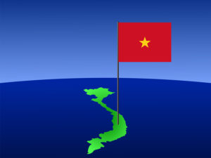 map of Vietnam and Vietnamese flag on pole illustration